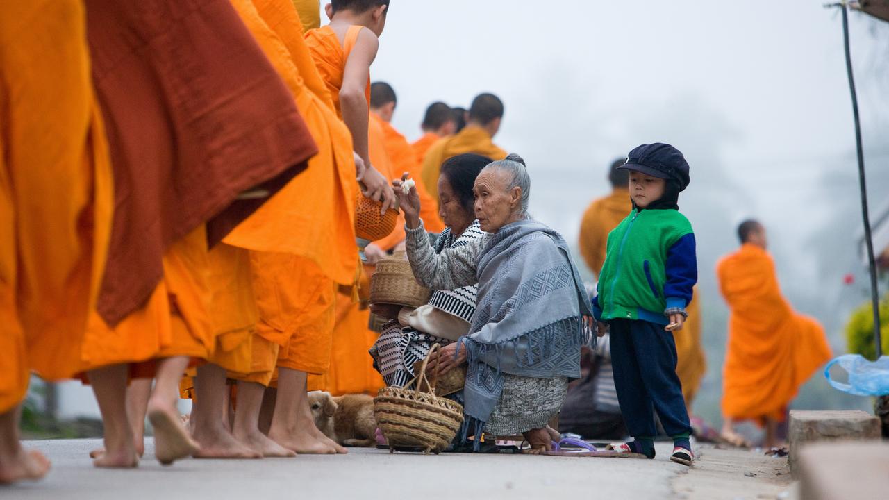 Luang Prabang - giving alms to monks