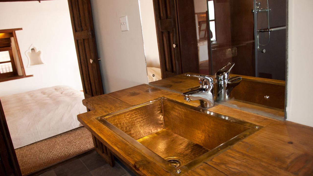 Wooden crafted sink at Inn Patan