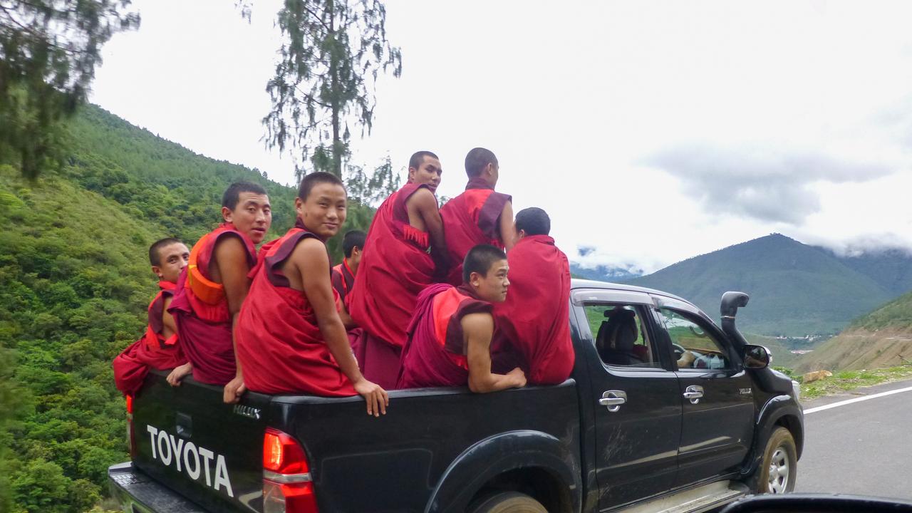 monks in a pickup truck, Bhuatn
