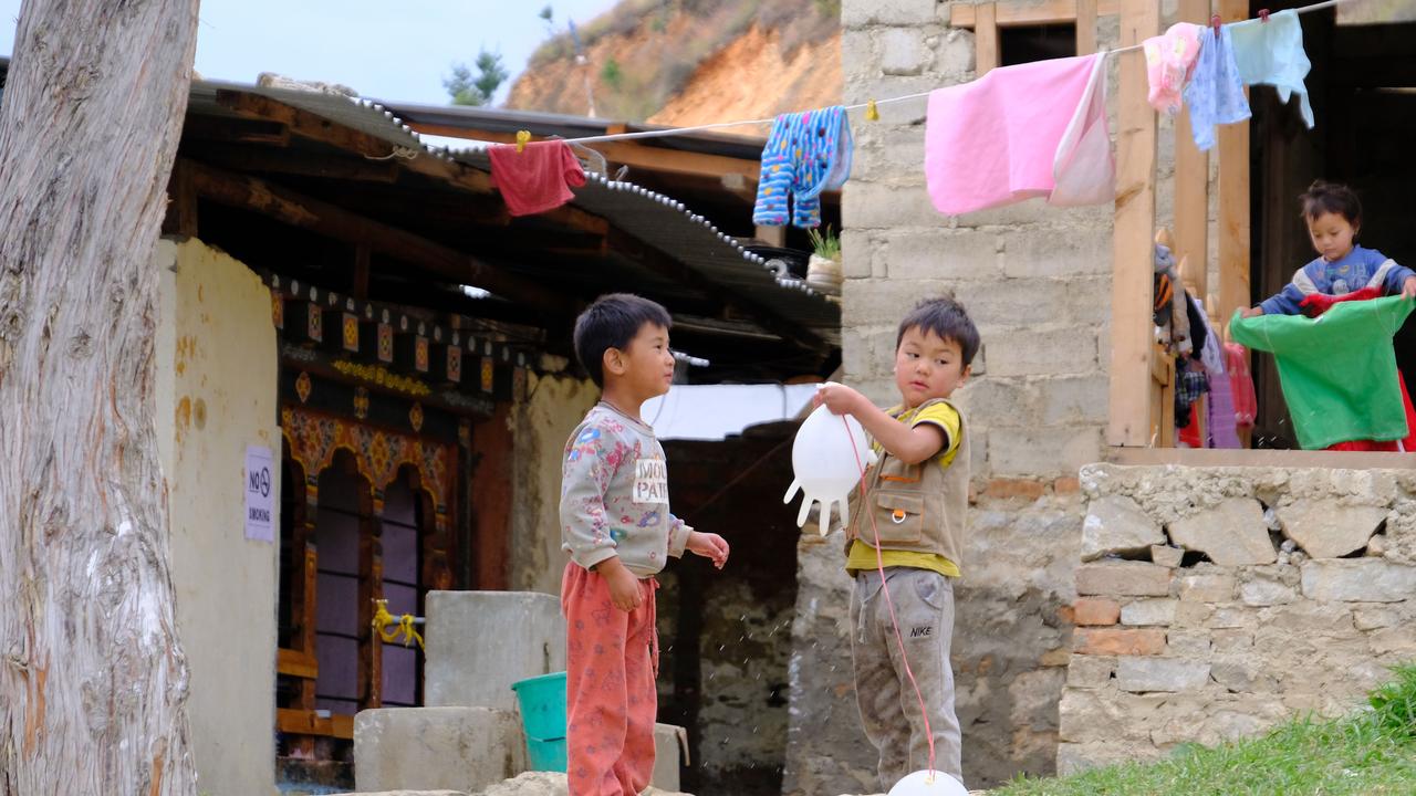 kids playing near Paro, Bhutan
