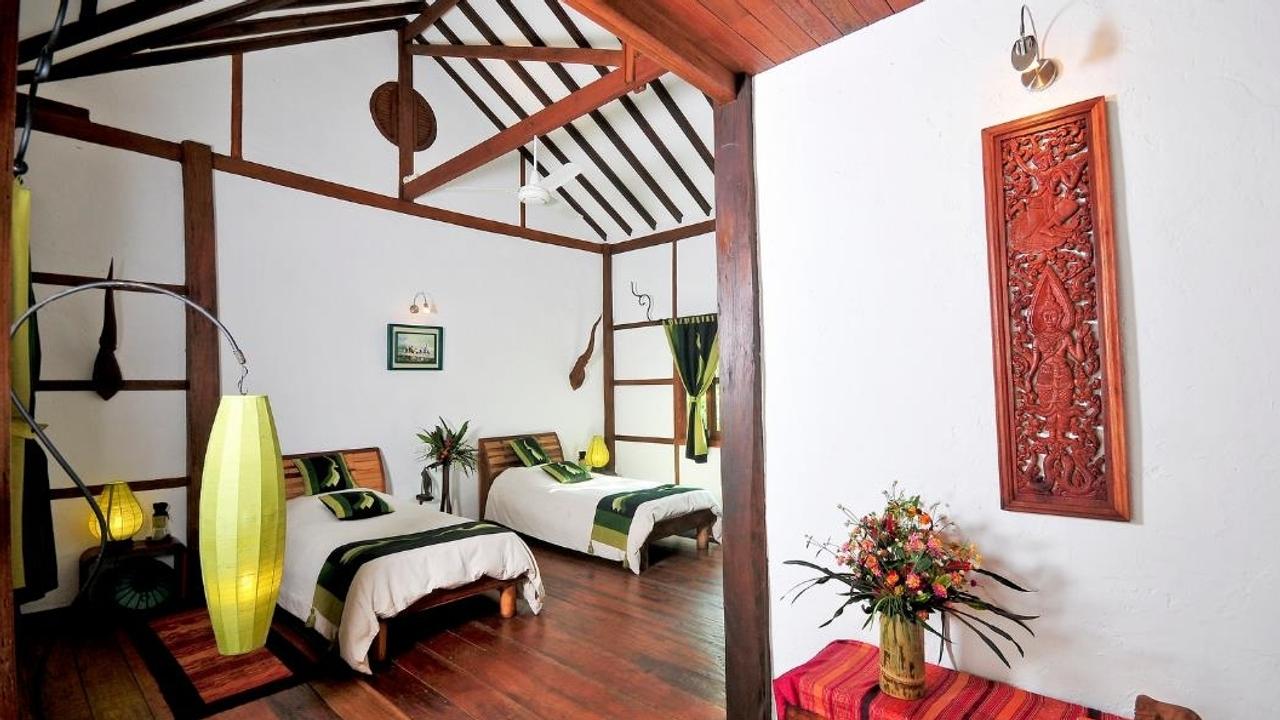 Twin bedroom at Muang La Resort
