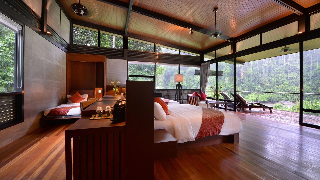 Bedroom overlooking jungle at Borneo Rainforest Lodge