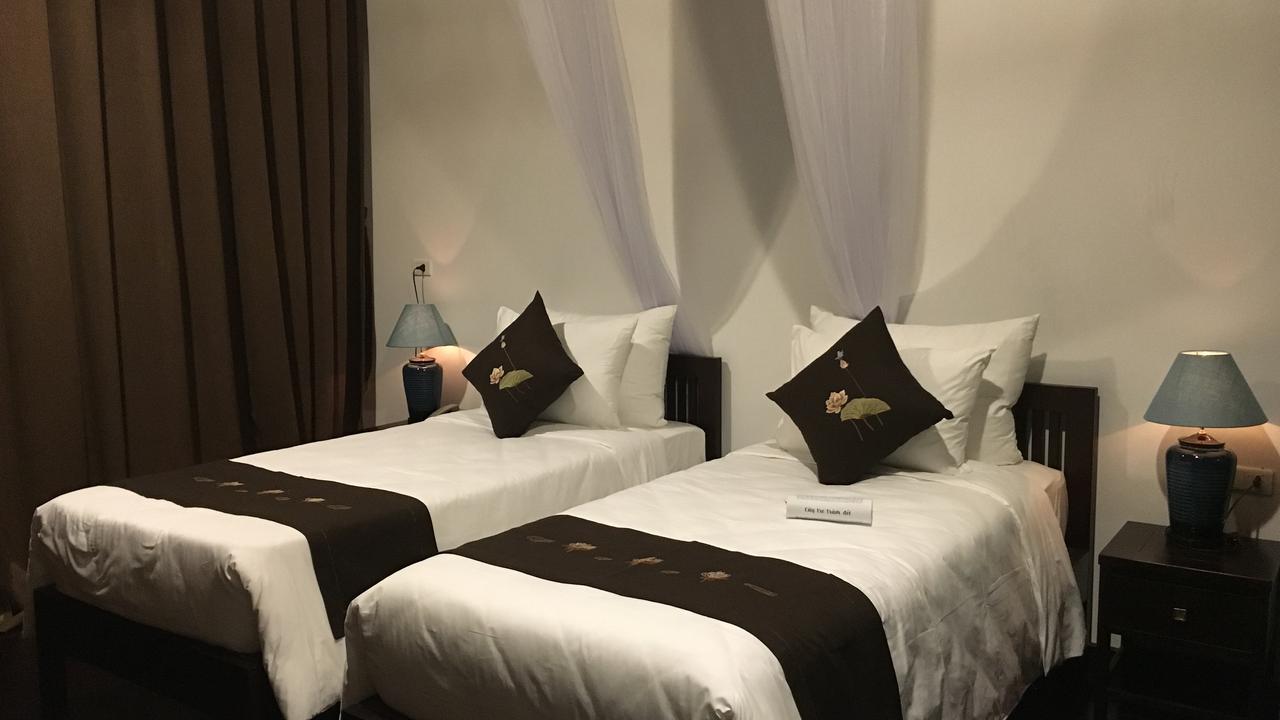 Twin room at Aravinda Resort