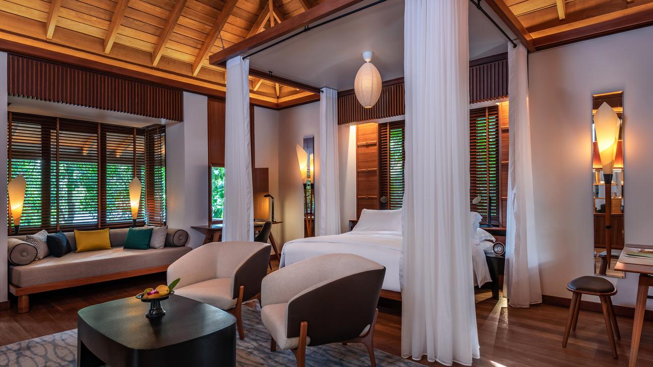 Villa with canopy bed at The Datai