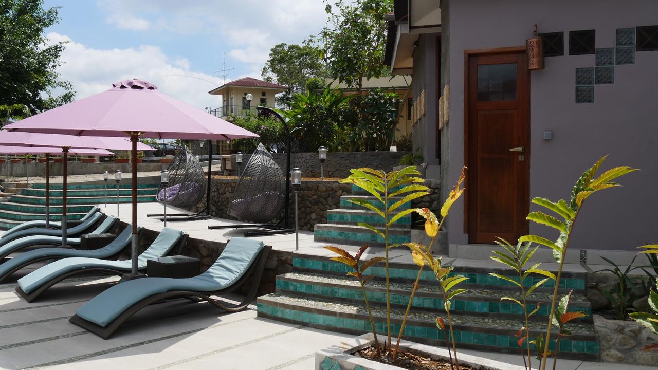 Lounge by the pool at Rumah Tengah Sawah