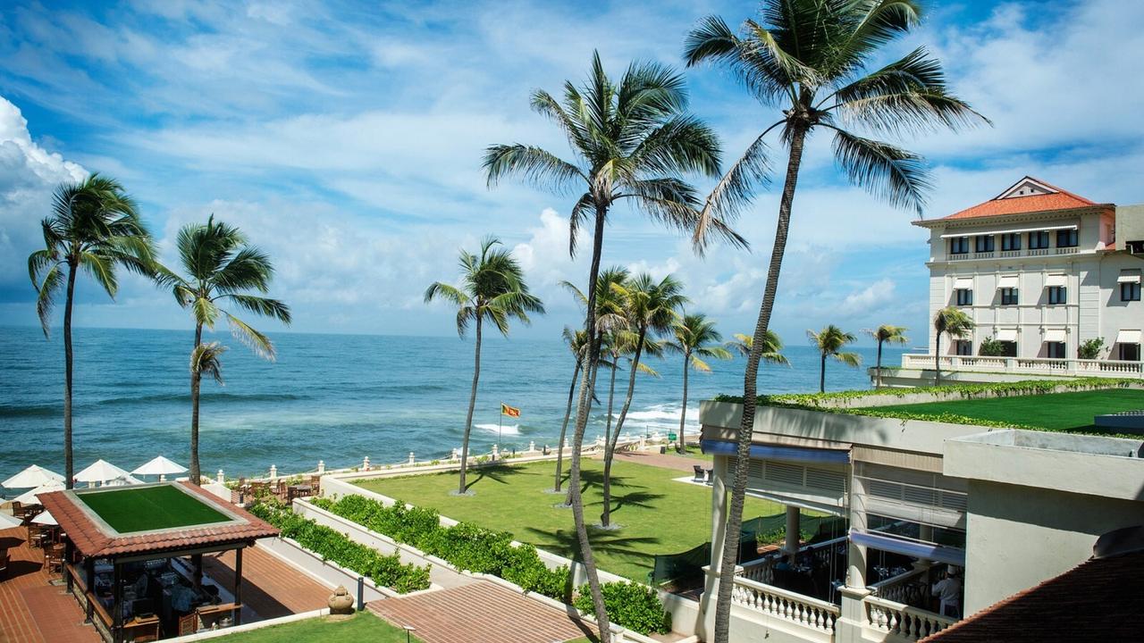 Galle Face Hotel with palm trees