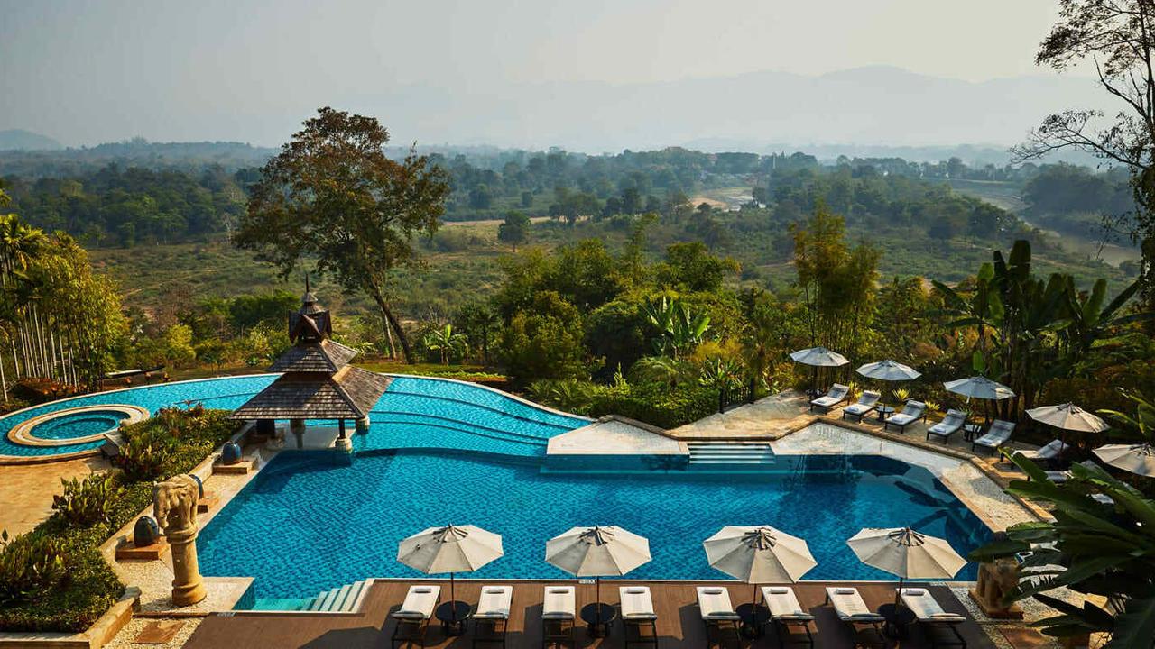 Infinity pool and green countryside views at Anantara Golden Triangle Elephant Camp