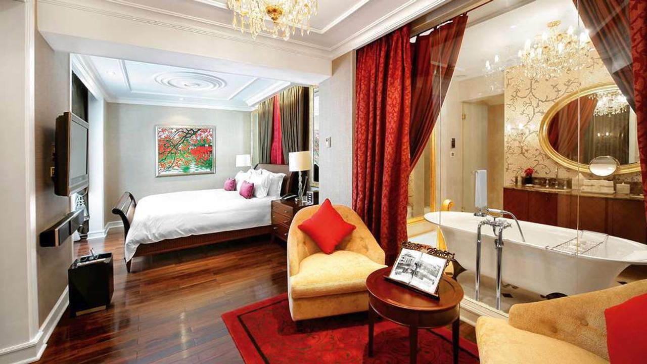 Bedroom with bath tub at Sofitel Legend Metropole Hanoi