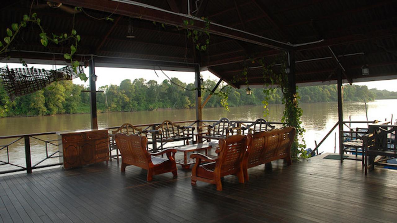 Seating area overlooking the river at Kinabatangan Riverside Lodge