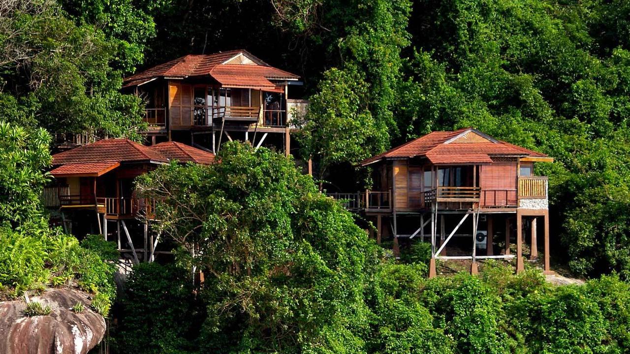 Stilted bungalows in jungle at Japamala Resort