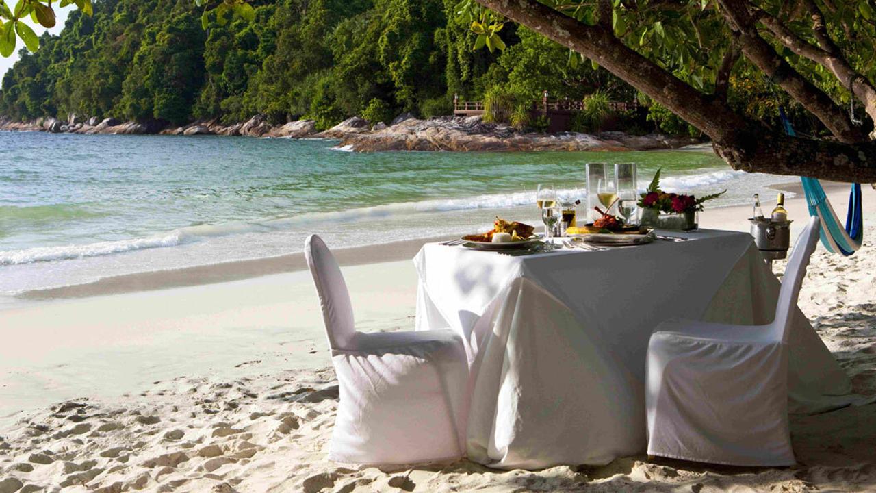 Dining on the beach at Pangkor Laut Resort