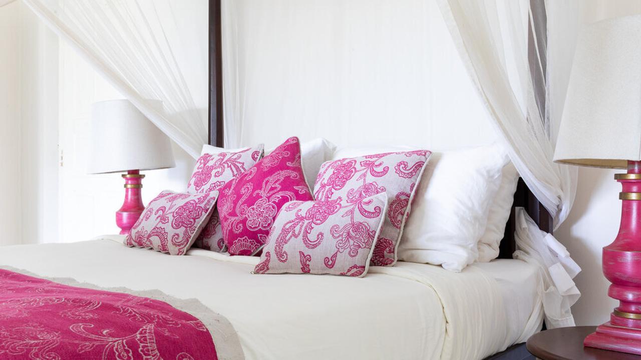 Pink and white bed at the Ashburnham Estate