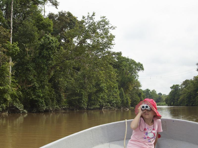 Girl on boat in Borneo