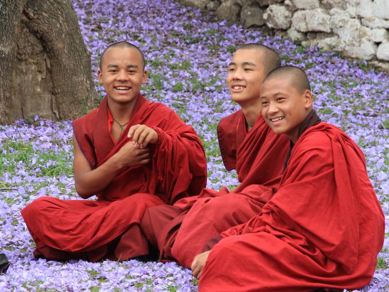 Monks smiling