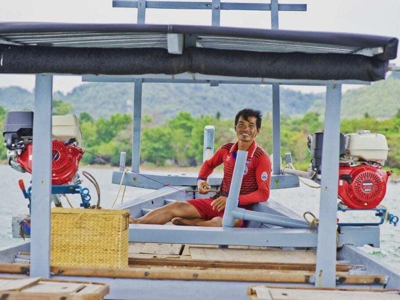 Local guide on boat in Kep