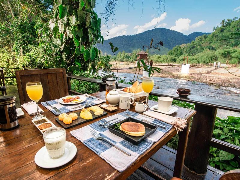 Breakfast overlooking the river at Muang La Resort