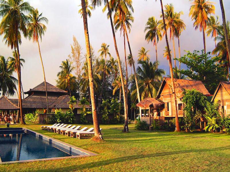 Swimming pool and palm trees at Bon Ton Resort